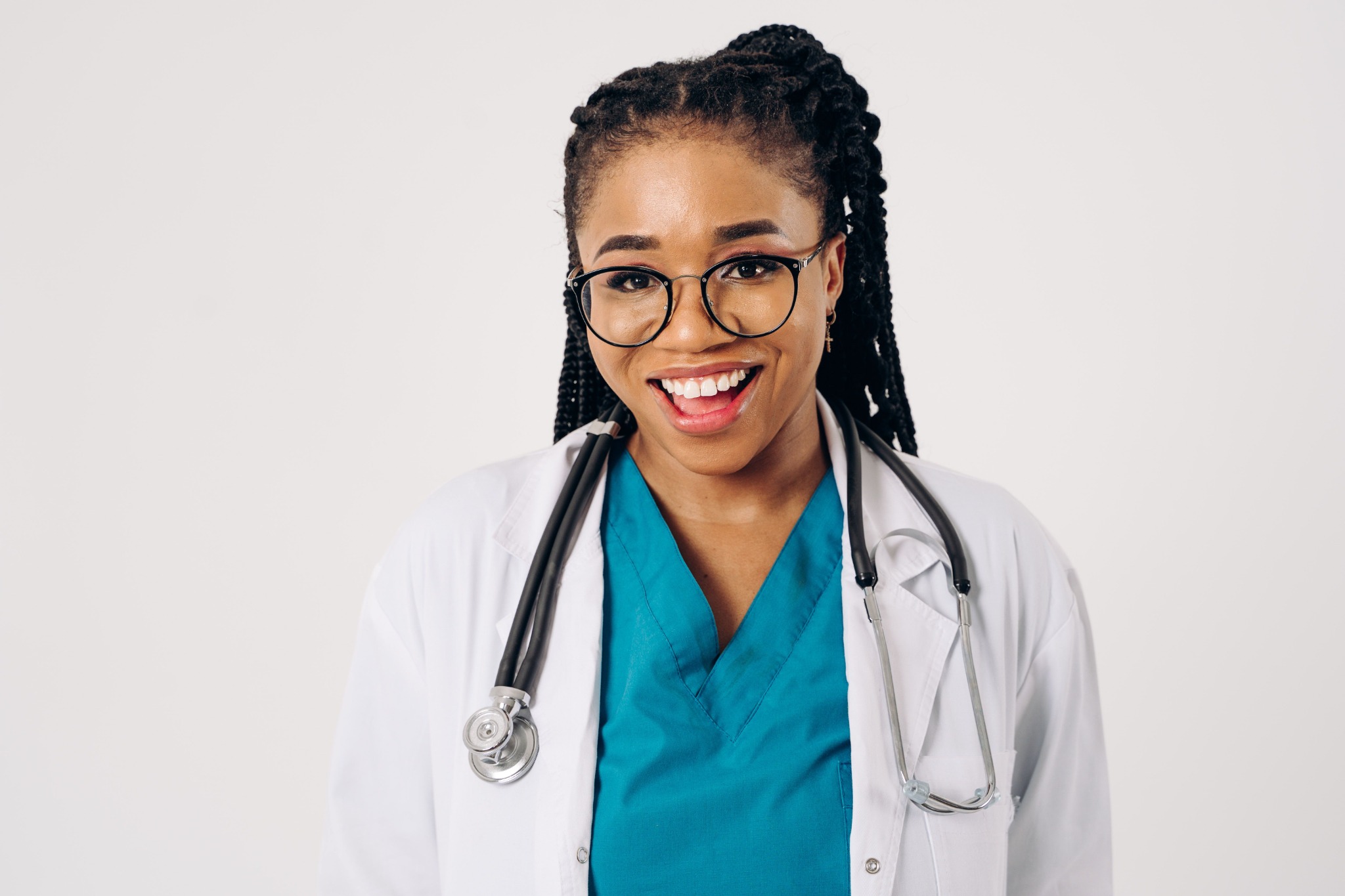 Friendly physician in a white medical coat